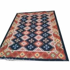 red and blue handloom woolen carpet at