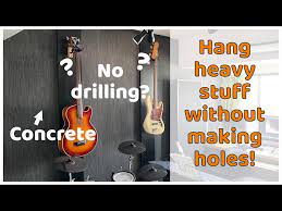 Hang Guitars Without Drilling Holes In