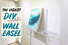 My wife thought it would be better used as both, and asked me to hang some of her painting. The Easiest Diy Adjustable Wall Easel Blog Heather M Roberts Art