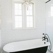 Star Pendant Over Claw Foot Tub Design