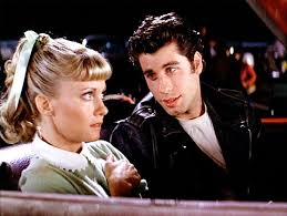 John travolta in grease pictures. You Want To Sing Along To Grease Just Be Aware Of What The Movie Is Really About Datebook