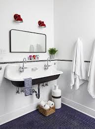 white sink with blue penny tile floor