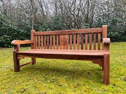 engraved wooden memorial garden bench