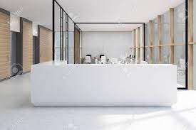 Corporate office reception area detail and wall elevations. White Reception Desk Standing In An Office With Glass Walls Stock Photo Picture And Royalty Free Image Image 70978806