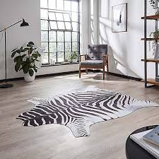 faux zebra print rug by think rugs