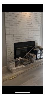 Mount A Tv On Tile Wall Above Fireplace