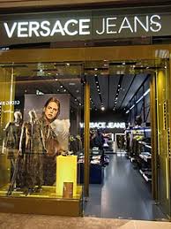 The new versace la greca code features the greek key along with the versace logo in various sizes and color combinations. Versace Wikipedia