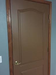 stained wood trim and painted doors