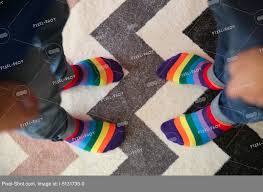 couple with colorful socks standing