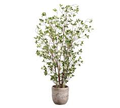 This simple tree comes in a black planter's pot that can be nested into the decorative container of your choice. Faux Potted Mini Leaf Tree Potted Olive Tree Cement Planters Faux Tree
