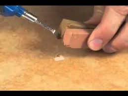 how to repair a hole or chip in a tile
