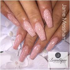 Acrylic nails — nail enhancements made by combining a liquid acrylic product with a powdered acrylic product — have a staying power in the beauty industry that's hard to beat. Short Pink And Glitter Acrylic Nails Nail And Manicure Trends