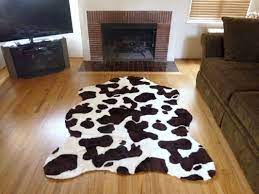 plush brown white faux cow hide rug