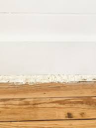 fill gaps between floor and wall trim