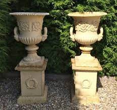 large pair antique cast iron garden urns