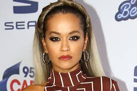 By submitting my information, i agree to receive personalized updates and marketing messages about rita ora based on my information, interests, activities. Rita Ora Wears Sports Bra And Leggings With Daddy Necklace Footwear News