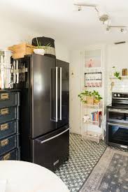 black appliances in small kitchen