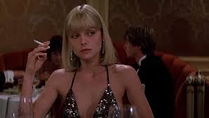 Michelle pfeiffer lived on soup and cigarettes to play cocaine addict elvira in scarface. Michelle Pfeiffer S Halston Style Costumes In Scarface