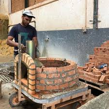 Firebricks, about 3.8cm (1 1/2) thick sitting on 15mm (1/2 or so) of soft sand and a hinged trammel in place to build the dome. How The Best Wood Fired Brick Pizza Ovens Are Built