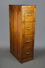 slim oak 4 drawer filing cabinet with
