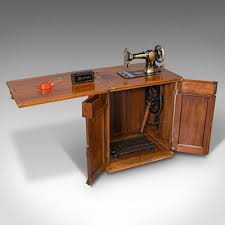 walnut sewing machine cabinet