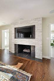floor to ceiling stone fireplace