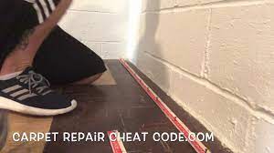 how to install carpet strips over