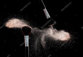 makeup brushes with flying powder stock