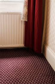 carpet pattern hotel rooms stock photos