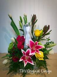Check spelling or type a new query. A Floral Arrangement With A Keepsake Angel Flower Oasis Funeral Flowers Funeral Flower Arrangements