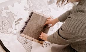 rolling unrolling montessori rugs