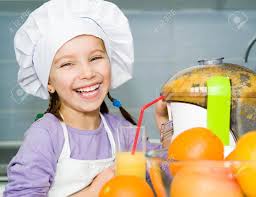 Girl Making Orange Juice With A Juice Extractor Stock Photo, Picture And  Royalty Free Image. Image 17385886.
