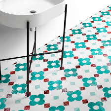 floor with tiles of turquoise flowers