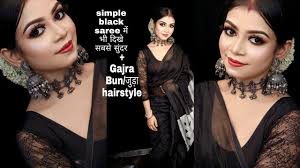 gajra hairbun with simple black saree