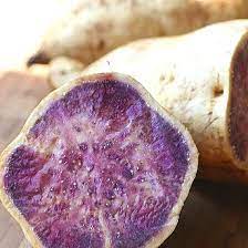 Murasaki sweet potatoes — have deep purple skin and white centers that turn golden once it's cooked. The Okinawan Sweet Potato A Purple Powerhouse Of Nutrition Down To Earth Organic And Natural