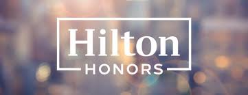 Do Hilton Honors members get free water?