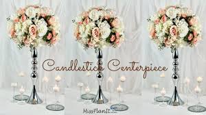 rose candlestick wedding centerpiece
