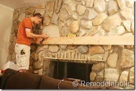 installing a wood mantel on a stone wall