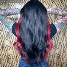 Purple hair with black shimmer looks luxurious with long curls. 10 Popular Red And Black Hair Colour Combinations