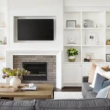 Fireplace Between Built In Cabinets