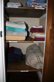 i decluttered my linen closet again