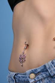 when can i change my belly ring the
