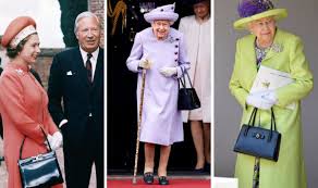 Queen Elizabeth II uses key accessory to end conversations - pictures |  Express.co.uk