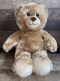 soft plush brown teddy bear big eyes