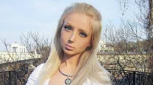 human barbie punched and strangled