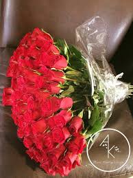 At barb's flowerland, our designers can make special creations just for you. 100 Roses Show Stopper Red Or Assorted By Ak Florist