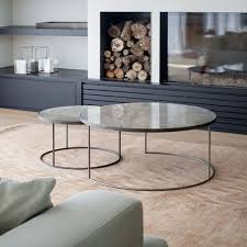 When guests are around or when it's the holiday season, the smaller tables can be pulled out from. Aged Mirror Nesting Coffee Table Set Nesting Coffee Tables Round Nesting Coffee Tables Mirrored Coffee Tables