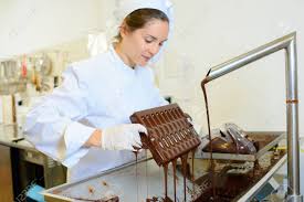 Chocolate Maker At Work Stock Photo, Picture And Royalty Free Image. Image  57753697.