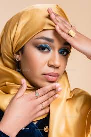 muslim woman in yellow hijab with