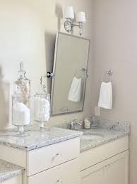 Can be mounted horizontally or vertically. Master Bath Pottery Barn Kensington Mirror Chrome Colonial White Granite Assessable Beige Neutral Bath Farmhous Master Bathroom Bathroom Framed Bathroom Mirror